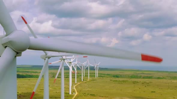 Wind Turbines And Agricultural Fields On A Autumn Landscape