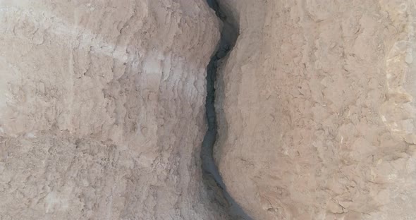 Aerial view of a canyon in the desert, Barak river, Negev, Israel. alt