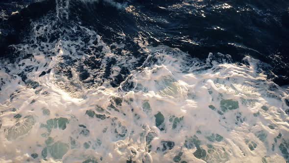 Looking Over Side Of Boat At Sunset alt