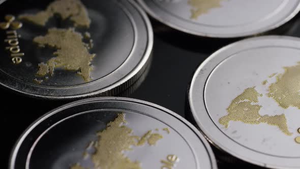 Rotating shot of Bitcoins  alt