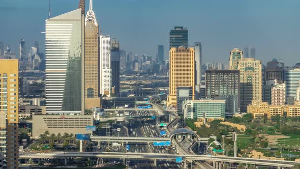 Aerial View of Dubai Marina Skyscrapers and Internet City Towers Timelapse with Traffic on Sheikh alt