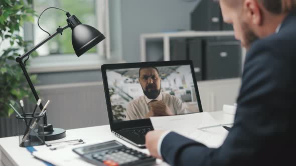 Business Partners Having Video Chat