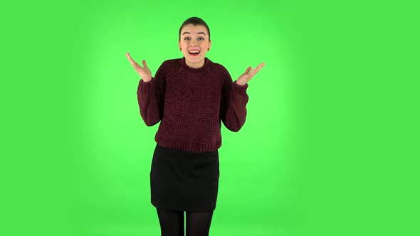 Very Surprised Girl with Shocked Wow Face Expression . Green Screen alt