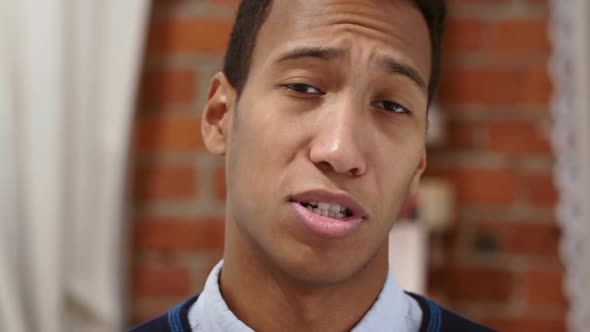 Online Video Chat Close Up of Talking Young African Man alt