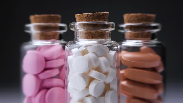 Colorful Pills in Bottles