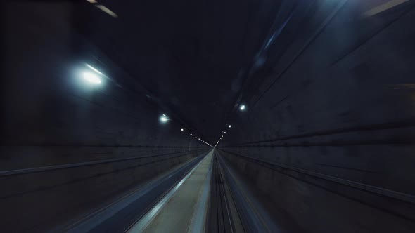 Underground Train Traveling in the Tunnel on High-speed alt