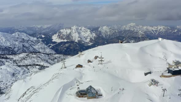 Aerial View of Ski Slopes in the Alps alt