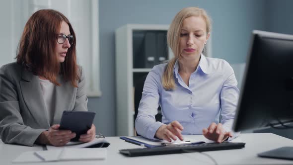 Business Women Working at Office