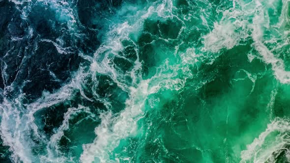 Waves of Water of the River and the Sea Meet Each Other During High Tide and Low Tide. alt