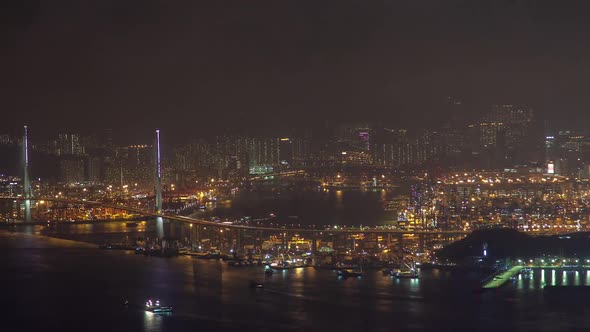 Timelapse Illuminated Hong Kong Cityscape Reflected in Water alt