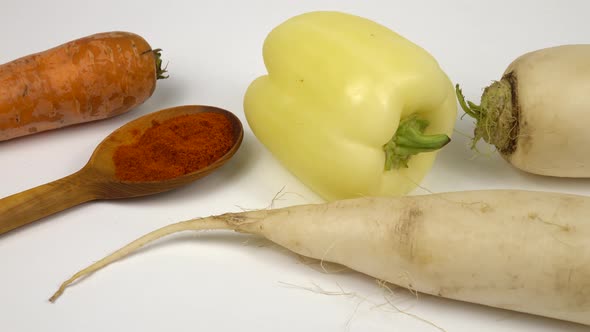 Fresh raw daikon radishes and carrot popular ingredients in vegetable salads and snacks