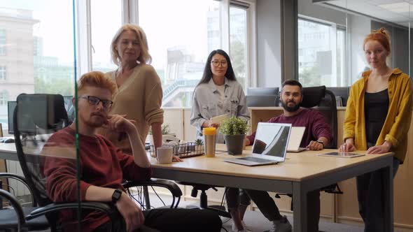 Portrait Of Multi-Ethnic Coworking Group alt