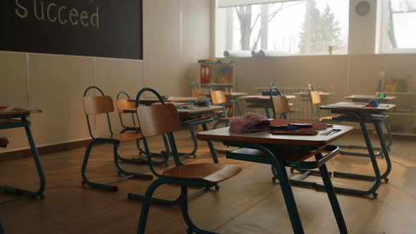 Desks and Chairs in Modern Classroom alt