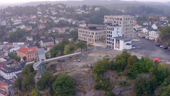 Government Office Buildings With Famous Glass Lift On Floyheia In Arendal, Norway. - aerial alt