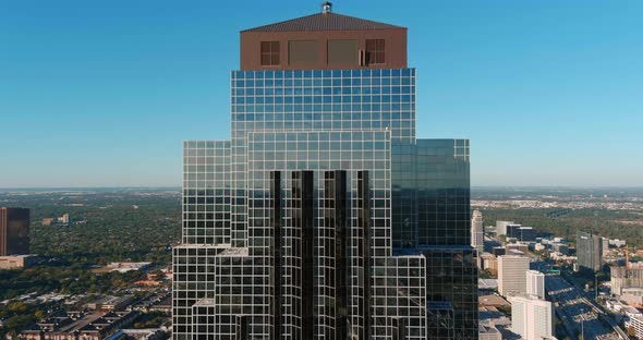 4k aerial shot of The Williams Tower in the Galleria Mall area in Houston, Texas alt