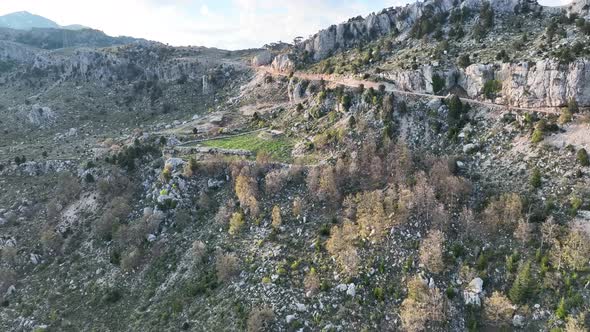 Mountain Sunset landscape high in the mountains aerial view 4 K alt