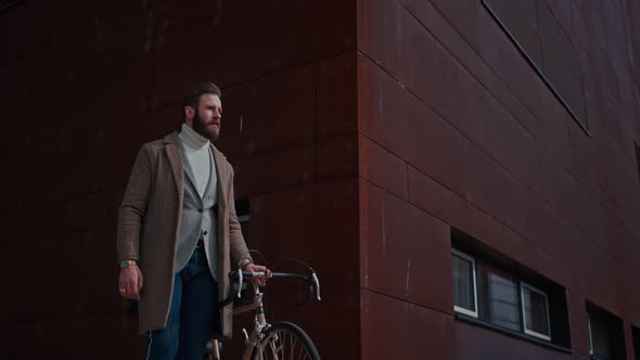 Young Man with Bicycle Going to Work alt