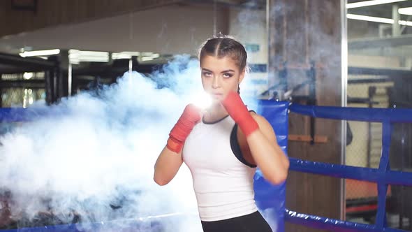 Portrait of Strong Muscular Fitness Woman Ready To Fight