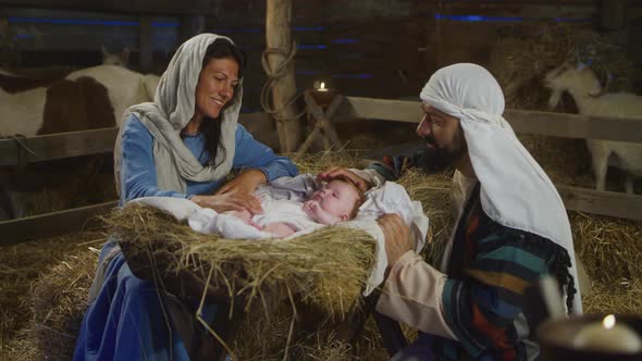 Happy Mary and Joseph with Baby Jesus Near Stalls, Stock Footage ...