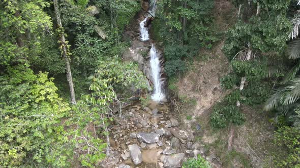 Drone flying towards the most beautiful waterfall in Negeri Sembilan