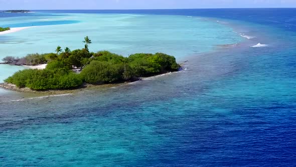 Aerial drone tourism of coastline beach trip by blue water with sand background alt