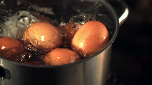 Super Slow Motion in the Pan is Cooked Fresh Eggs for Breakfast alt