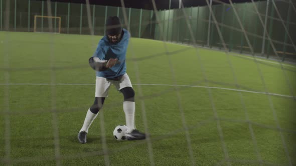 Man Training with Soccer Ball alt