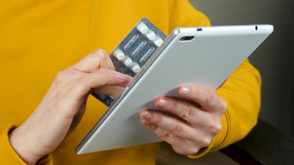 The Girl Makes an Order of Medicines Through an Online Store Pharmacy alt