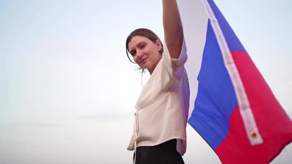 Russia's Independence Day, Patriot with a National Symbol in Her Hands