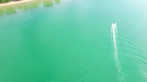4K aerial view of drone, fishermen's boats are sailing towards the shore. alt