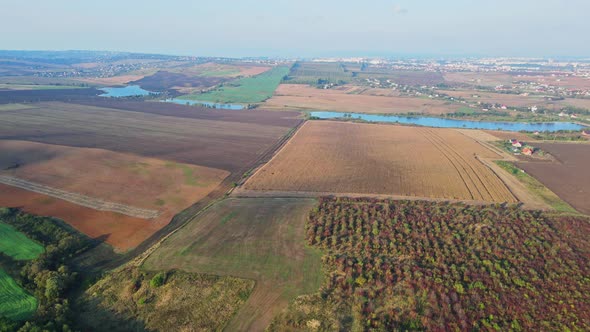 Flight over the fields behind the western Ukrainian village Aerial view.