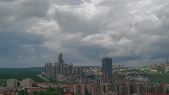 8K Mixed Cloudy Sky Over Modern City Buildings at Edge of Forest