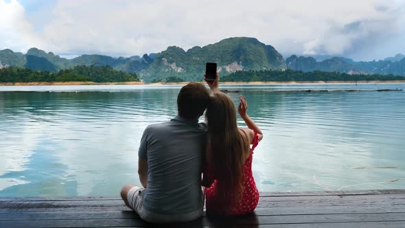 Pair of Man and Woman on Date Making Video Call Funny Selfie or Video Chat alt