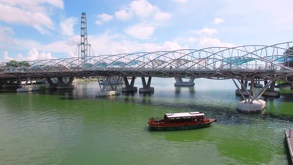 Aerial View of Helix Bridge, Singapore Flyer and Marina Bay. Singapore