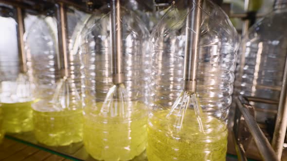 Automatic Line for Filling Bottles with Sunflower Oil alt