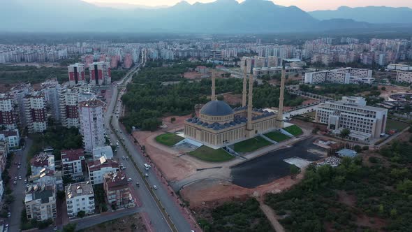 Aerial View of Modern City Buildings Skyline and Blue Mosque Minaret alt
