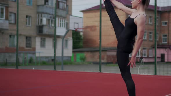 Girl Gymnast is Warming Up alt