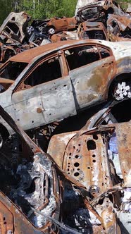 Vertical Video of Destroyed Cars in the City of Irpin Ukraine alt