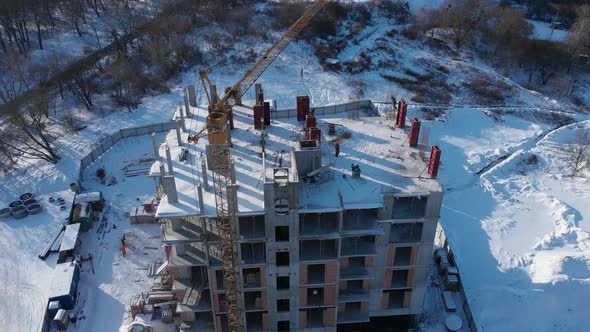 Aerial shot of building residental house on construction site.