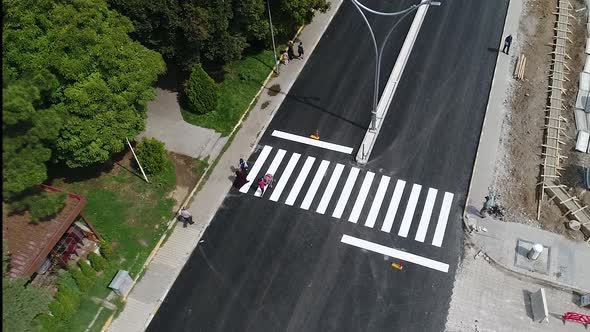 People Walking Over Crosswalk, Ariel view