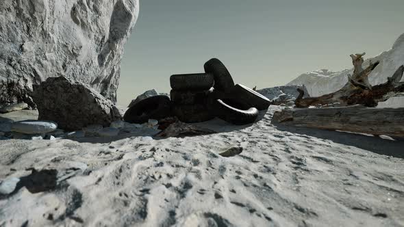 Old Car Tires on the Beach alt