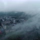 View from above of a city covered in fog - VideoHive Item for Sale