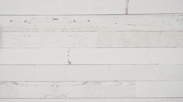 Flat lay. Step by step. Macadamia fudge cut in small cubes on a white serving dish alt