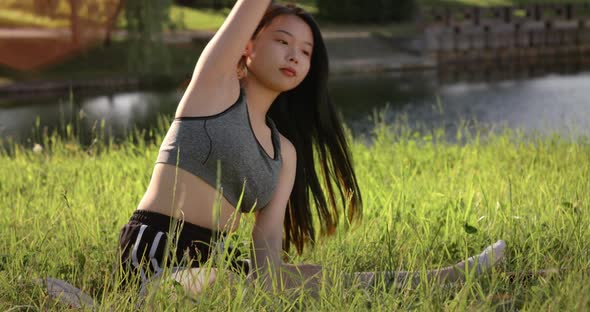 Young Asian Woman Was Sitting in Yoga in the Garden She Was Relaxed and Enjoyed the Workout