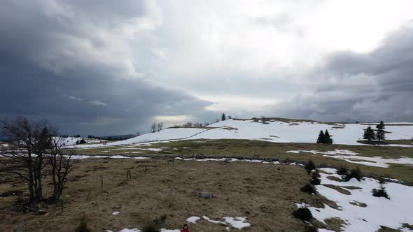 fpv drone shoot beautiful mountains in Creux Du Van, Neuchatel, Switzerland. Adventure videos in win alt