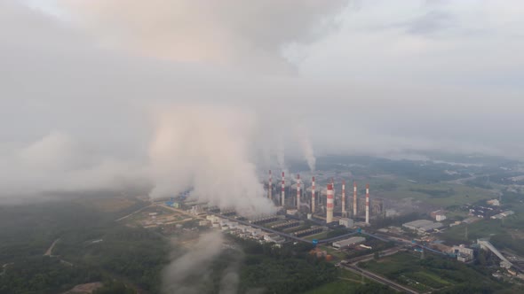 Aerial view of Mae Moh Coal Power Plant with smoke and toxic air from cooling,