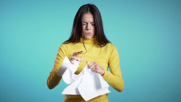 Serious businesswoman tearing contract in pieces, Angry furious female office worker  alt