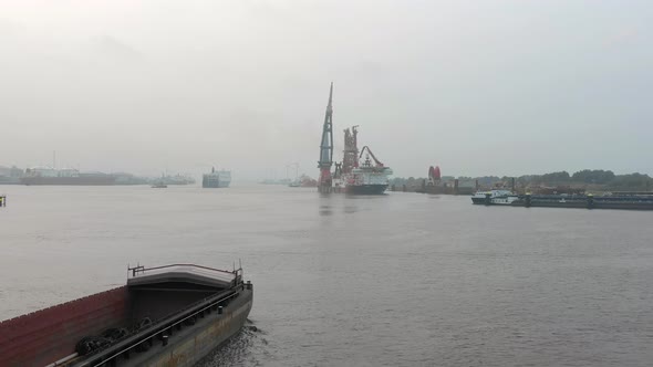 Aerial View of a Bulk Carrier Ship Used for Moving Silt and Sand in Rotterdam alt
