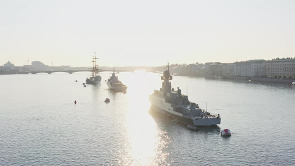 Aerial Morning Cityscape with Warships in the Waters of the Neva River Before the Holiday of the alt