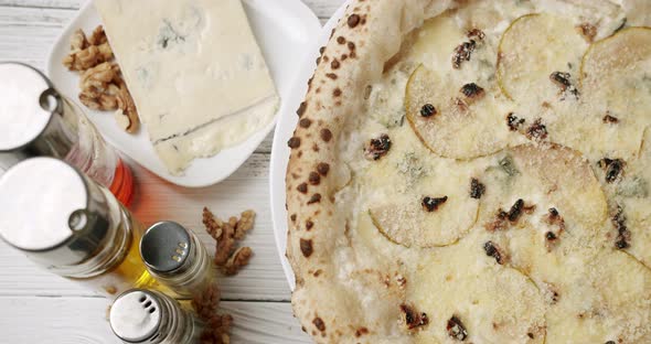 Fresh Out of the Oven Four Cheese Pizza Ready for Eating alt